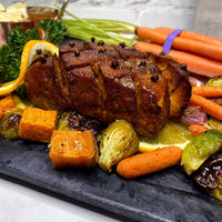 Jack Daniels Tofu Ham;Simple, delicious, beautiful holiday entrée has the right balance of sweet, smoky, and salty flavors. Succulent, smoky, slow roasted marinated tofu, served with a sticky, brown sugar Jack Daniels sauce and healthy roasted vegetables makes a perfect centerpiece for your holiday feast.