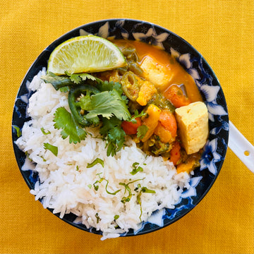 Thai Red Vegetable Curry Healthy, super cozy, rich and creamy dish with lots of vegetable power. Abundance of seasonal vegetables simmered in fragrant creamy broth with healing exotic spices. Served over fluffy brown rice will tickle your taste buds.