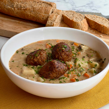 Country Meatball Fricassee A simple meal filled with comforting flavors of French countryside. Plant based meatballs stewed with healthy vegetables and aromatic garden herbs in a thick, rich creamy sauce. Served with multigrain French crusty bread.