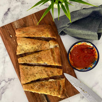 Stuffed Focaccia: Simple, Italian inspired meal  has all the flavors of your favorite pizza. Golden, warm, yeasty  bread stuffed with plant based savory  sausage and cheese, served with a side of a robust sweet marinara sauce makes easy, fun party dinner.