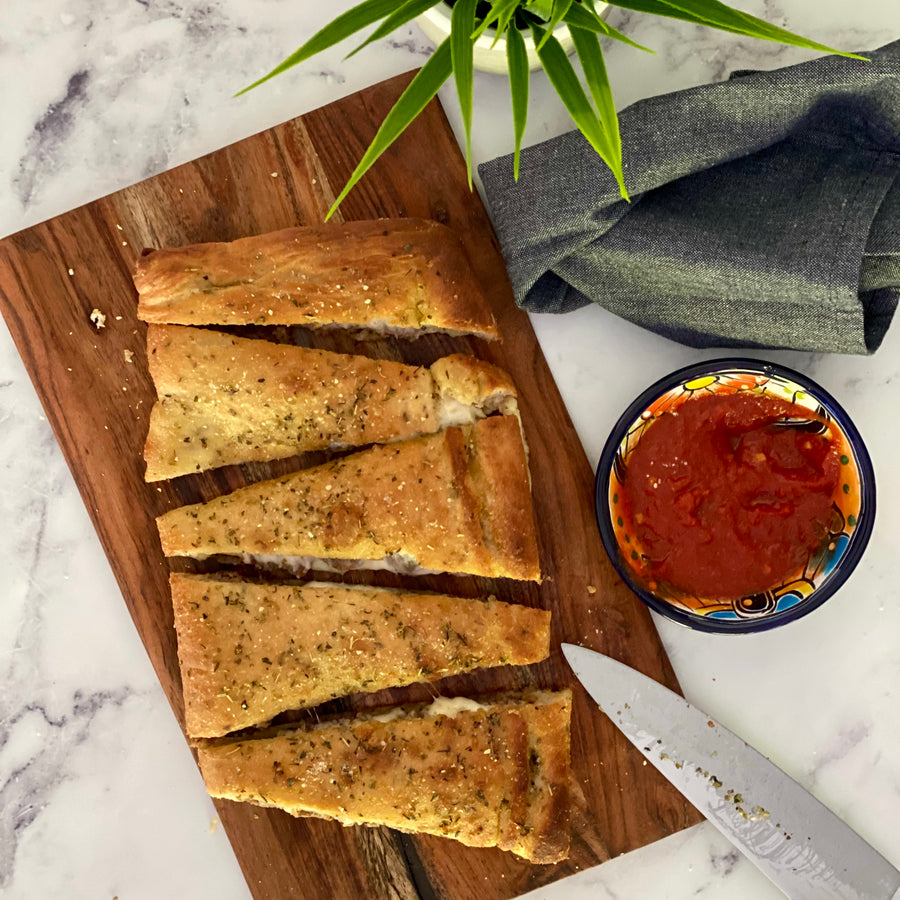 Stuffed Focaccia: Simple, Italian inspired meal  has all the flavors of your favorite pizza. Golden, warm, yeasty  bread stuffed with plant based savory  sausage and cheese, served with a side of a robust sweet marinara sauce makes easy, fun party dinner.