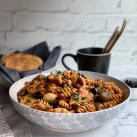 One Pot Greek Pasta: Rich, flavorful, punch of protein one pot wonder. Tender pasta, garlic, olives, artichokes, tomatoes, chickpeas and capers cooked in veggie broth with Mediterranean spices makes easy delicious fun dinner.