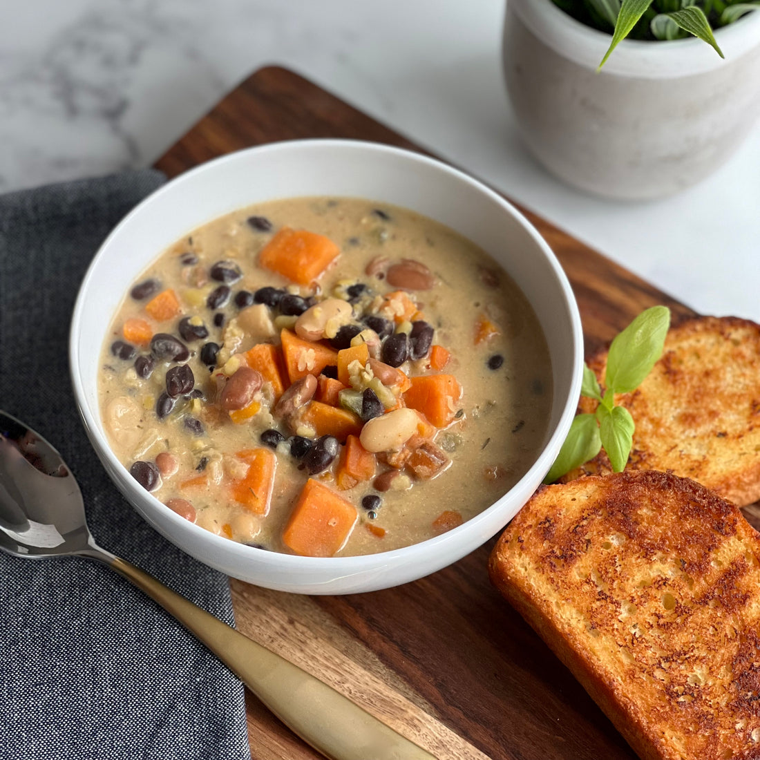 3 Bean Calico Chowder Healthy, rich, nourishing, satisfying soup loaded with fiber and protein. Sweet potatoes, onions, celery, carrots, fennel, and mixed beans simmered in silky, creamy, thyme and sage perfumed vegetable broth, lead into a big, nutritious, comforting bowl of soup.
